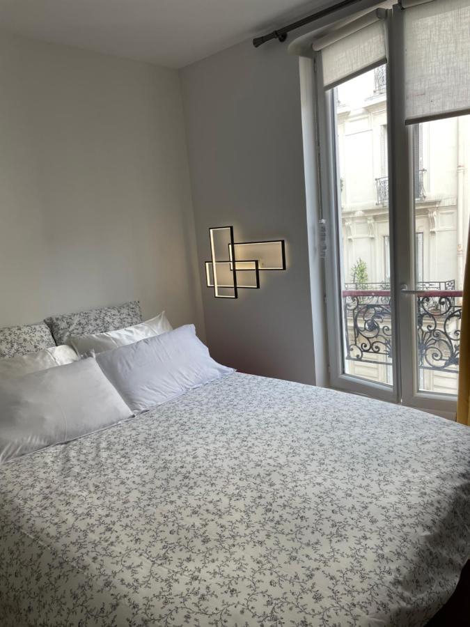 Appartamento Montmartre Cosy Parigi Esterno foto